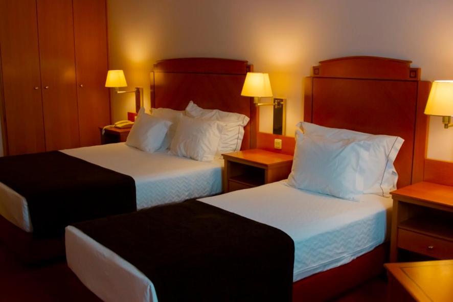 Quarto Triplo com Vista Cidade
