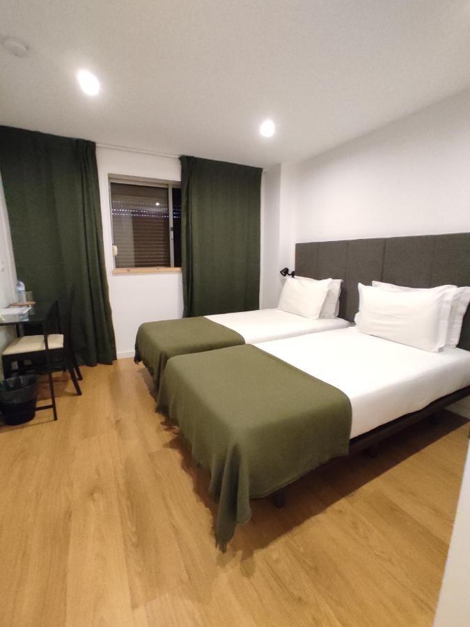 Quarto Twin com Casa de Banho Privativa